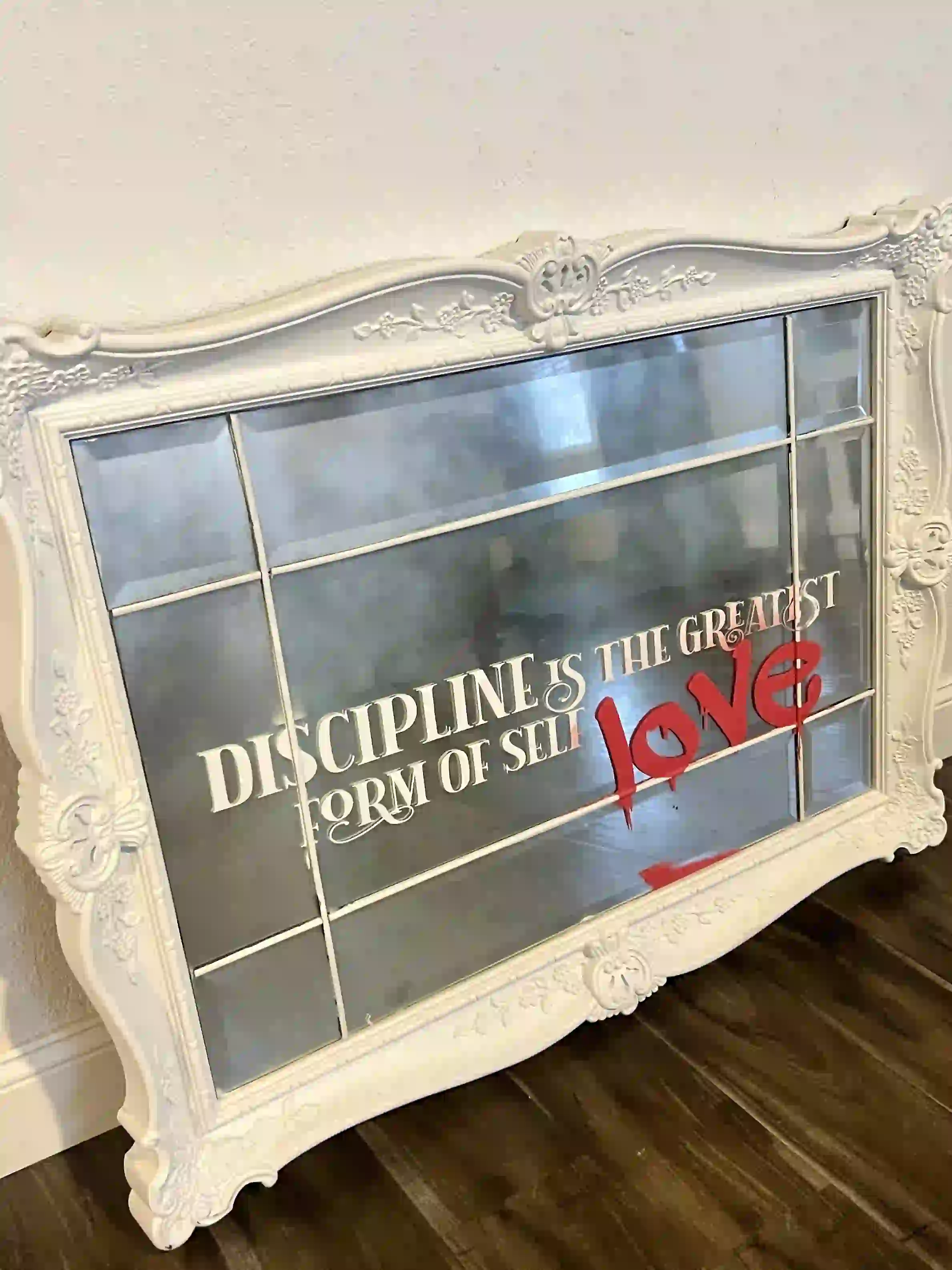 Disipline is love spray-painted artwork